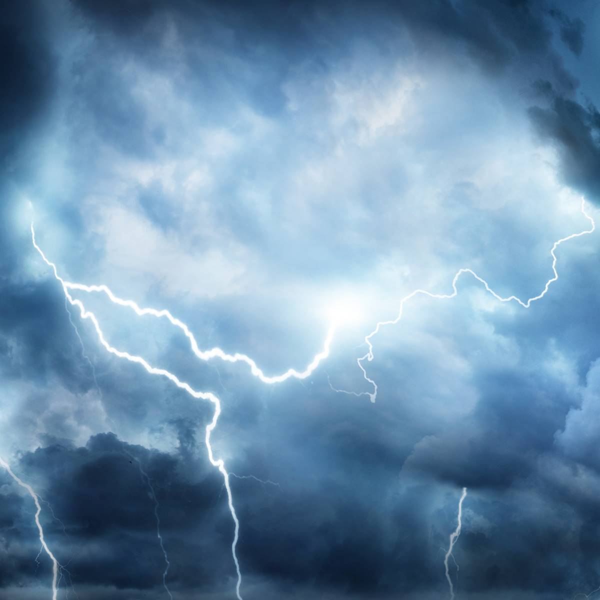 Storm clouds with lightning that can cause Mission Bend roof damage