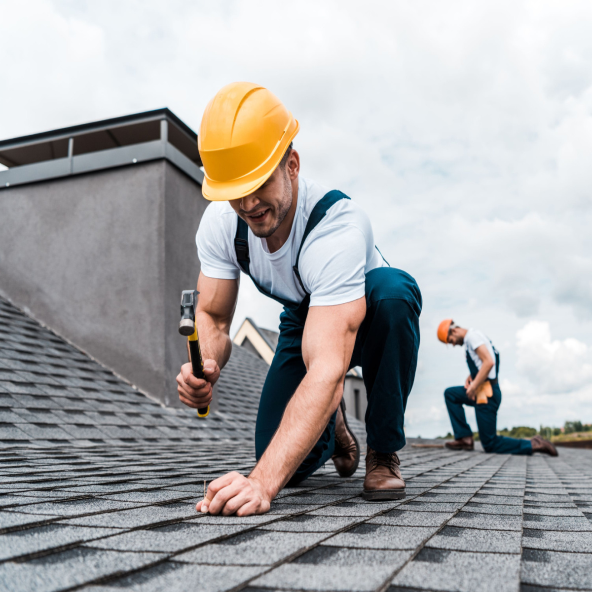 Jersey Village roofer performing repairs