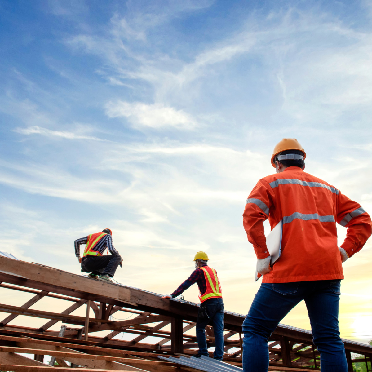 A Jersey Village roofer oversees a Jersey Village roof replacement by Blue Ribbon Roofing.